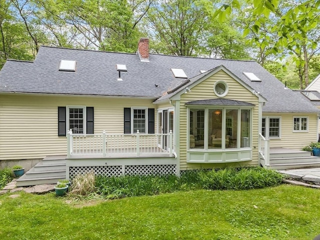31 Spectacle Hill Rd, Bolton, MA 01740 - rear view of house featuring a sunroom, a wooden deck, a chimney, and a yard