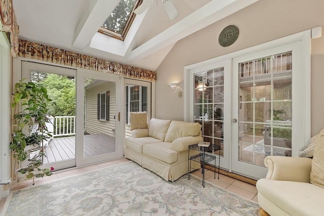 31 Spectacle Hill Rd, Bolton, MA 01740 - sunroom / solarium featuring tile patterned flooring, a ceiling fan, a skylight, and high vaulted ceiling