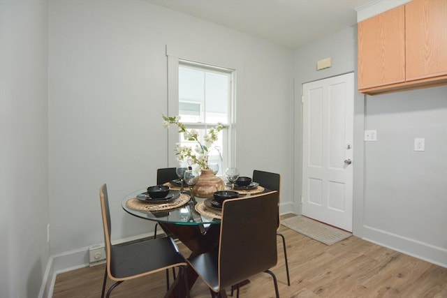 318 Charles St, Fitchburg, MA 01420 - dining room featuring light wood finished floors and baseboards