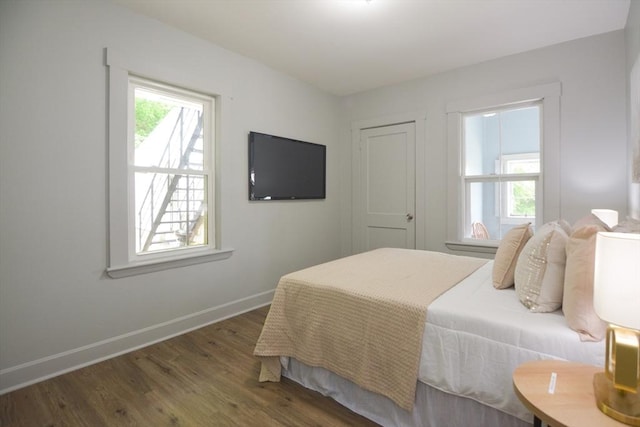 318 Charles St, Fitchburg, MA 01420 - bedroom with baseboards and wood finished floors