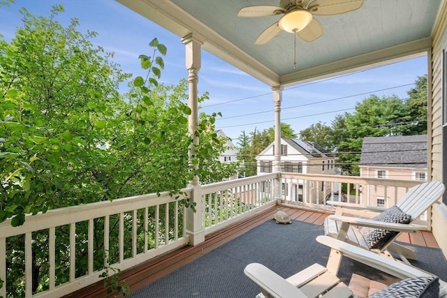 view of patio / terrace featuring a balcony and ceiling fan