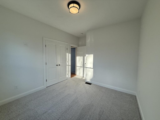 empty room with carpet floors