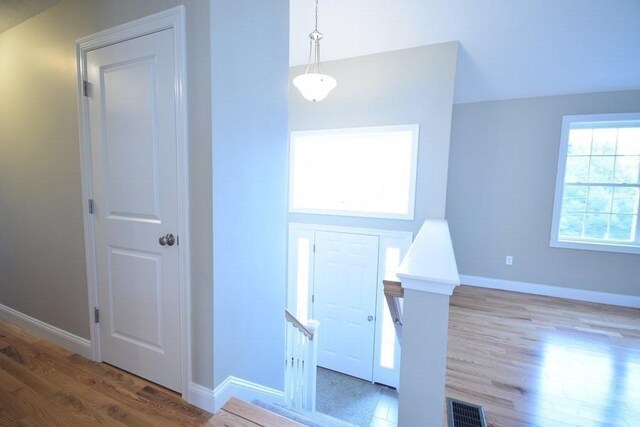 interior space with hardwood / wood-style flooring