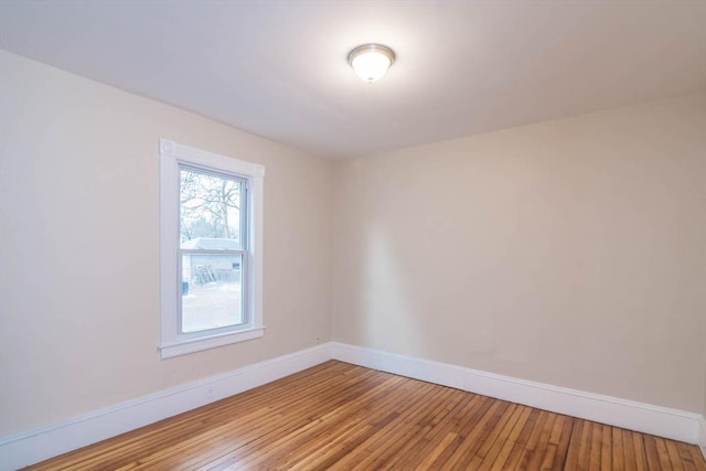 unfurnished room featuring light hardwood / wood-style floors