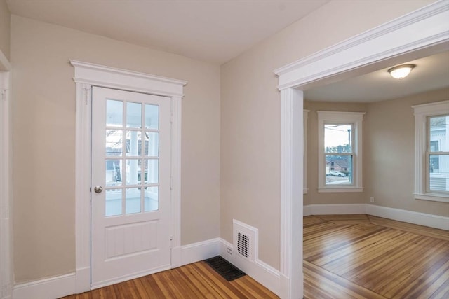 doorway to outside featuring hardwood / wood-style floors