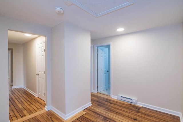 interior space featuring hardwood / wood-style flooring and a baseboard radiator