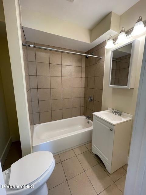 70-72 Chase Ave, North Adams, MA 01247 - full bath with tile patterned flooring, bathing tub / shower combination, toilet, and vanity