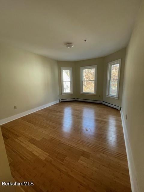 70-72 Chase Ave, North Adams, MA 01247 - unfurnished room with wood finished floors and baseboards