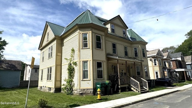 70-72 Chase Ave, North Adams, MA 01247 - view of front of home featuring a front yard