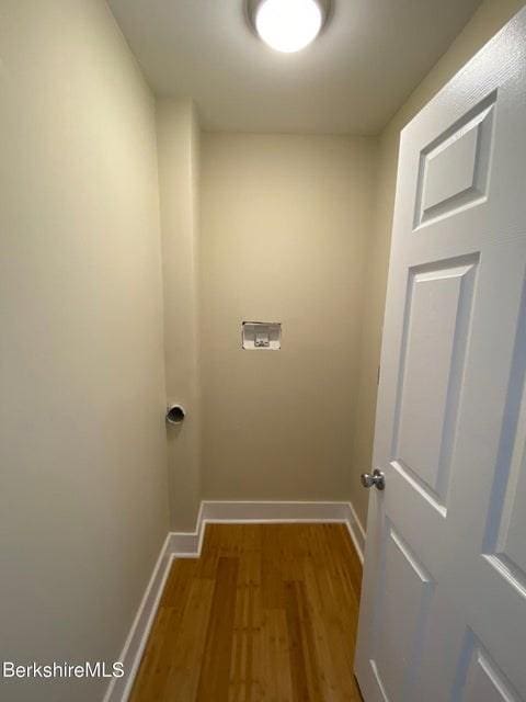 70-72 Chase Ave, North Adams, MA 01247 - laundry room featuring wood finished floors and baseboards