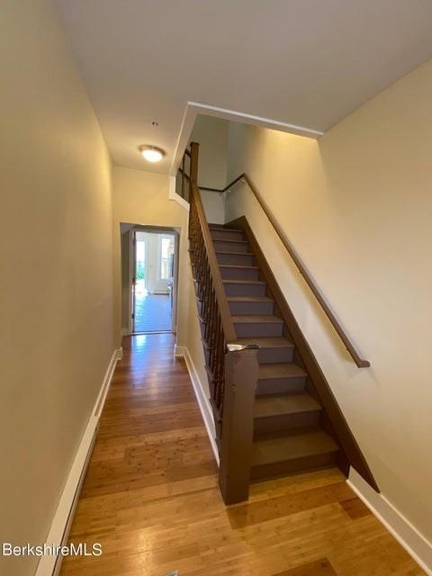 70-72 Chase Ave, North Adams, MA 01247 - stairs featuring wood finished floors and baseboards