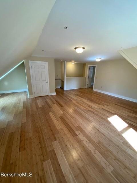 70-72 Chase Ave, North Adams, MA 01247 - additional living space with wood finished floors, lofted ceiling, and baseboards