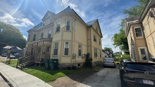 70-72 Chase Ave, North Adams, MA 01247 - view of home's exterior with metal roof