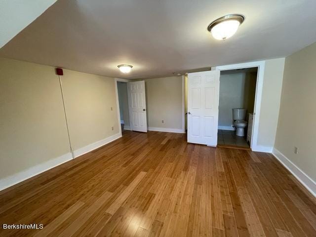 70-72 Chase Ave, North Adams, MA 01247 - unfurnished bedroom with wood finished floors and baseboards