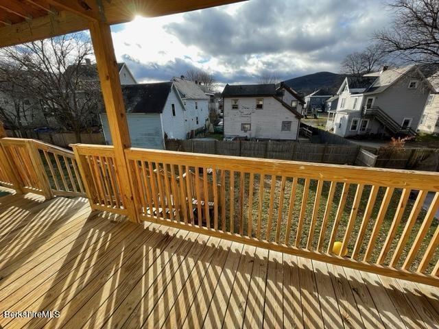 70-72 Chase Ave, North Adams, MA 01247 - wooden deck featuring a fenced backyard and a residential view