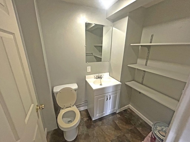 44 Howarth Rd, Oxford, MA 01540 - half bathroom with toilet, vanity, and baseboards