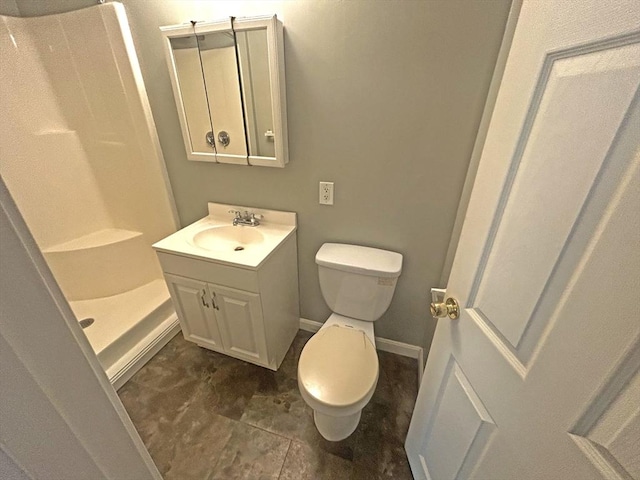 44 Howarth Rd, Oxford, MA 01540 - full bathroom with toilet, a shower stall, vanity, and baseboards