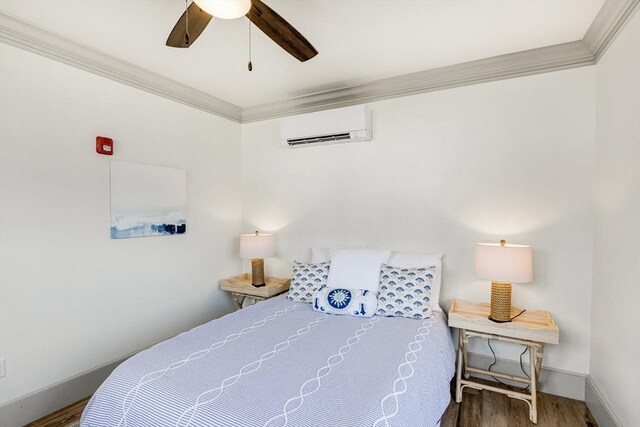 2-6 Market St Unit 3, Newburyport, MA 01950 - bedroom with a wall mounted AC, ornamental molding, wood finished floors, and ceiling fan