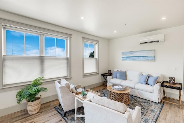 2-6 Market St Unit 3, Newburyport, MA 01950 - living area featuring an AC wall unit, wood finished floors, and recessed lighting