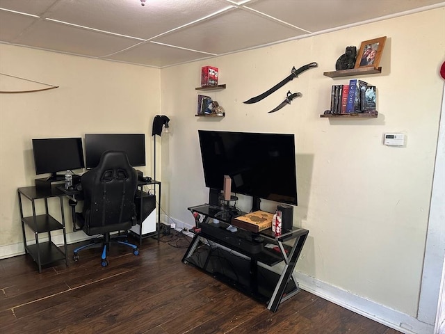 office area featuring baseboards and wood finished floors