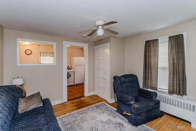 16 Fairfield Ave, Northampton, MA 01062 - sitting room featuring radiator, wood finished floors, a ceiling fan, and baseboards