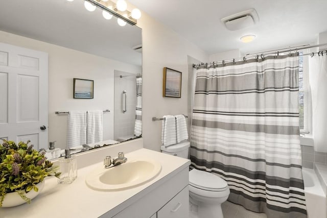 456 Belmont St Unit 21, Watertown, MA 02472 - full bath featuring tile patterned flooring, vanity, visible vents, and toilet