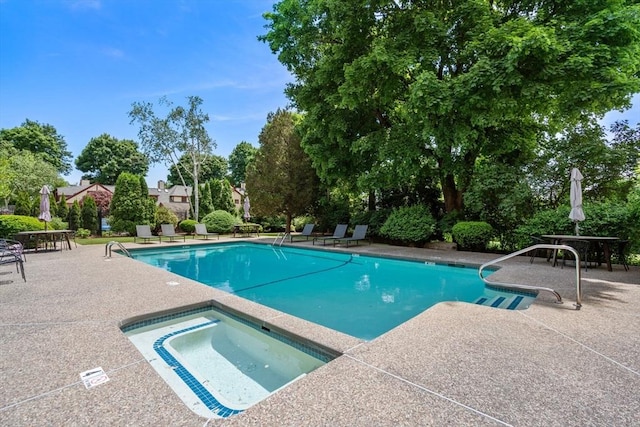456 Belmont St Unit 21, Watertown, MA 02472 - community pool featuring a patio area and a community hot tub