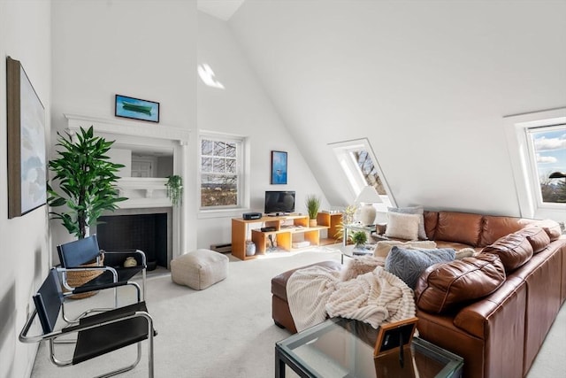 456 Belmont St Unit 21, Watertown, MA 02472 - living room featuring baseboard heating, high vaulted ceiling, a fireplace, and carpet