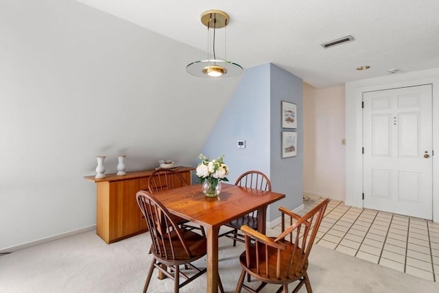 456 Belmont St Unit 21, Watertown, MA 02472 - dining room featuring light colored carpet, baseboards, and visible vents