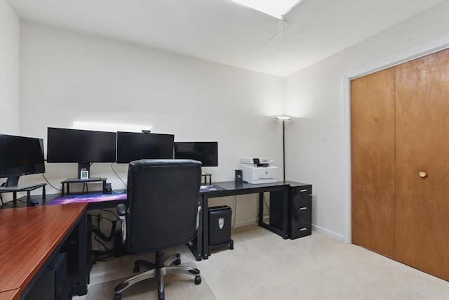 office featuring carpet floors and baseboards