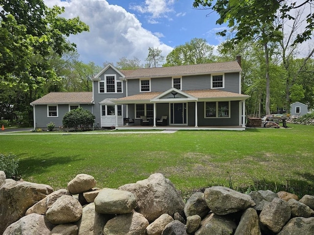 355 Tilden Rd, Scituate, MA 02066 - back of property featuring a chimney and a yard