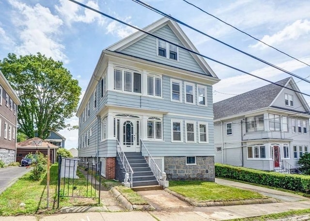 22-24 Ellison Ave Unit 1, Boston, MA 02126 - view of front of property featuring a front lawn