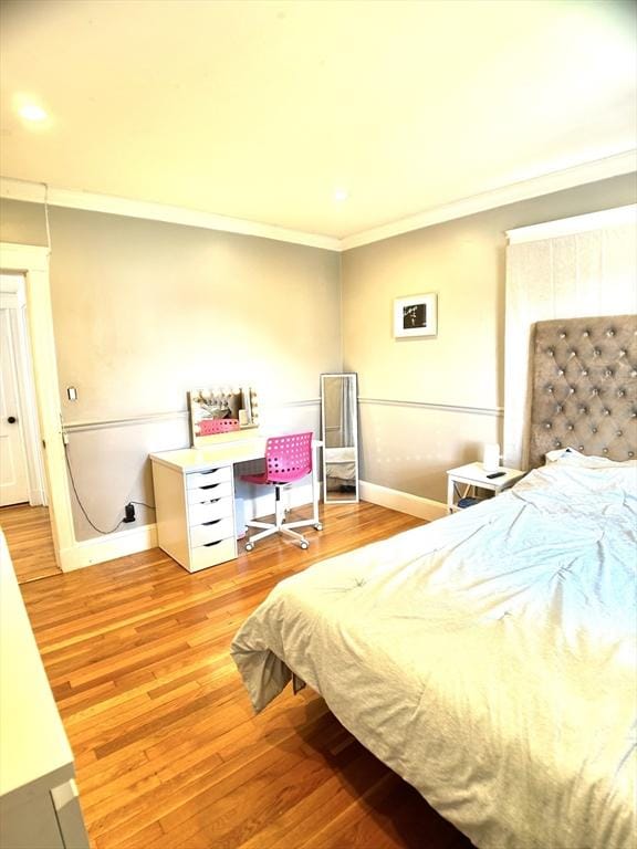 22-24 Ellison Ave Unit 1, Boston, MA 02126 - bedroom with crown molding, light wood-type flooring, and recessed lighting