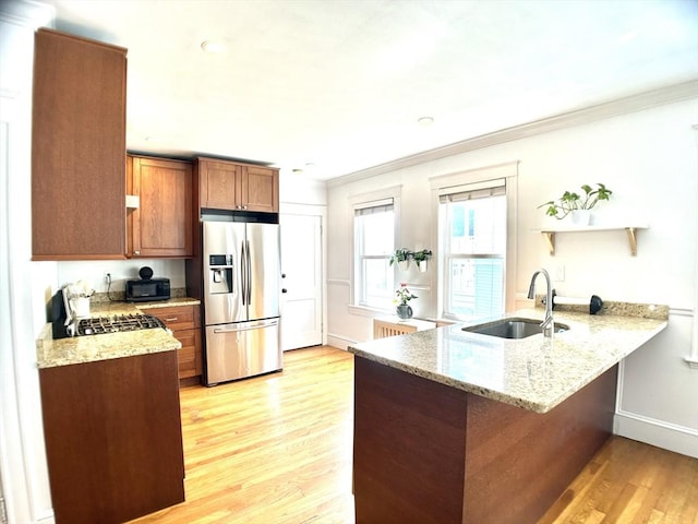 22-24 Ellison Ave Unit 1, Boston, MA 02126 - kitchen with stainless steel fridge with ice dispenser, ornamental molding, a peninsula, light wood-style floors, and brown cabinetry