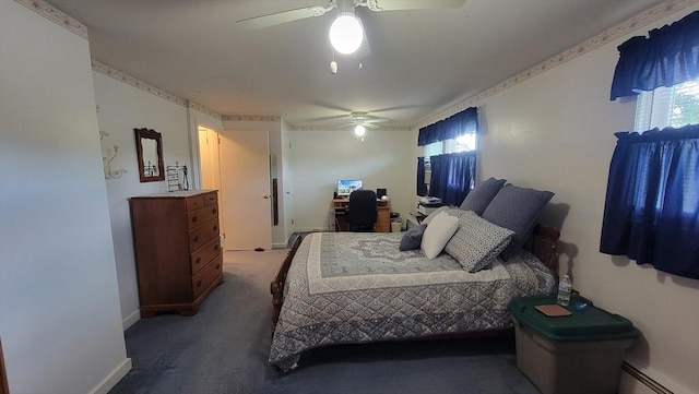 1285 Pendleton Ave Unit 1285, Chicopee, MA 01022 - bedroom featuring a baseboard heating unit, a ceiling fan, an office area, and carpet floors