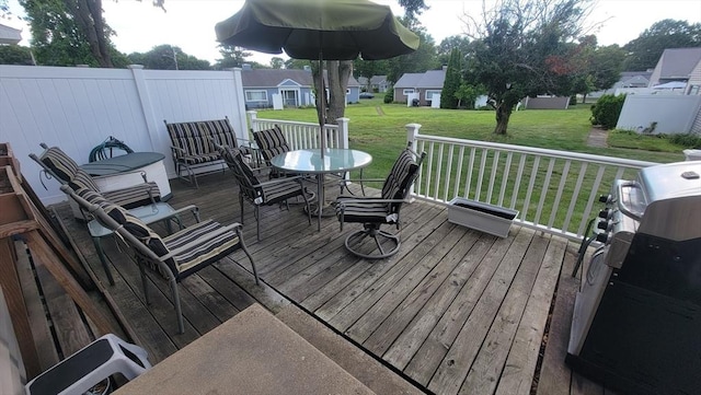 1285 Pendleton Ave Unit 1285, Chicopee, MA 01022 - wooden deck featuring a yard and outdoor dining space