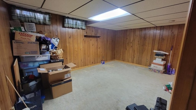 1285 Pendleton Ave Unit 1285, Chicopee, MA 01022 - finished basement with a drop ceiling, carpet floors, and wood walls
