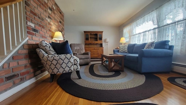 1285 Pendleton Ave Unit 1285, Chicopee, MA 01022 - living area with wood finished floors and a baseboard heating unit