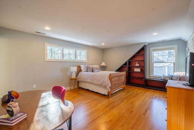 bedroom with light hardwood / wood-style flooring