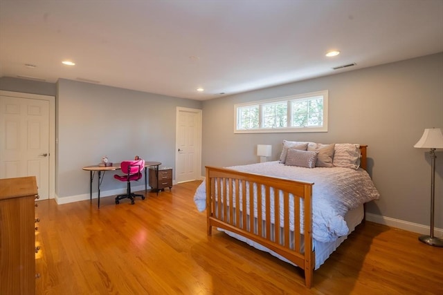 bedroom featuring wood-type flooring