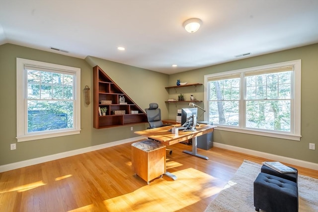 office area featuring a wealth of natural light and light wood-type flooring