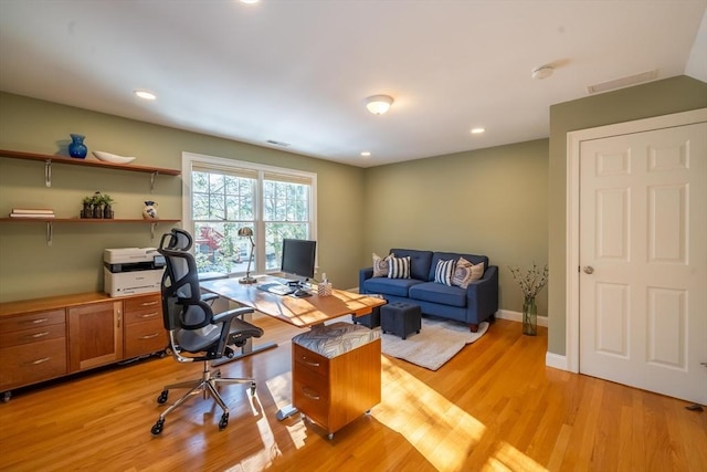 office area with light hardwood / wood-style flooring