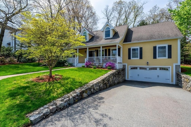 cape cod house with a garage, a front yard, and covered porch