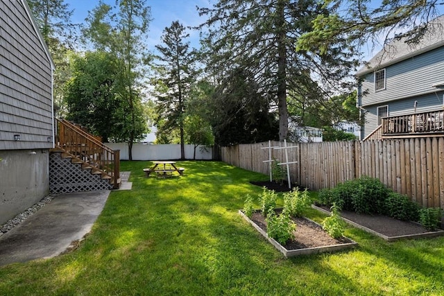 56 Beach St, Woburn, MA 01801 - fenced backyard with a garden and stairs