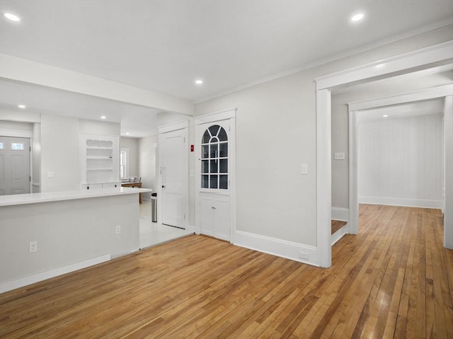 spare room featuring light hardwood / wood-style flooring