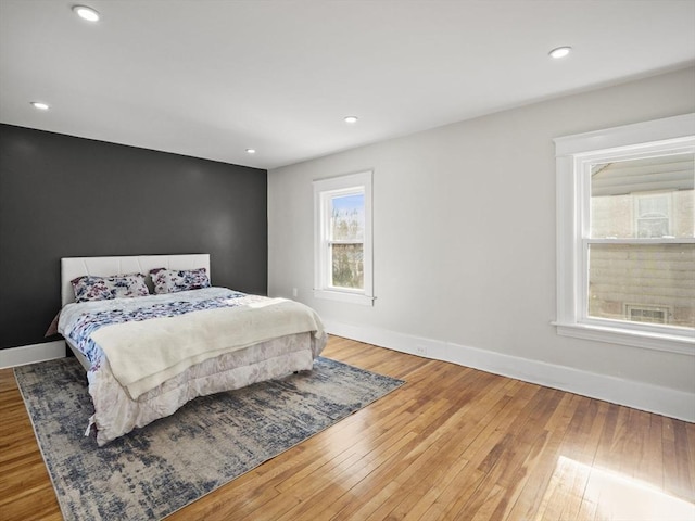 bedroom featuring wood-type flooring