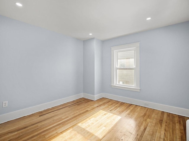 empty room with light wood-type flooring