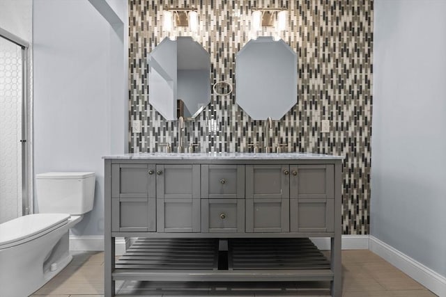 63 Perrin St, Boston, MA 02119 - full bath with toilet, vanity, and baseboards