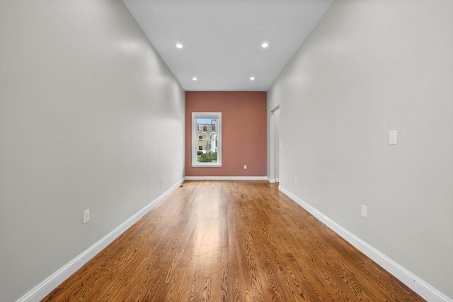 63 Perrin St, Boston, MA 02119 - unfurnished room with wood finished floors, recessed lighting, and baseboards