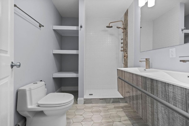 63 Perrin St, Boston, MA 02119 - bathroom featuring a stall shower, toilet, tile patterned floors, and double vanity